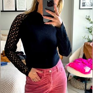 Black long sleeve open cut design - never worn